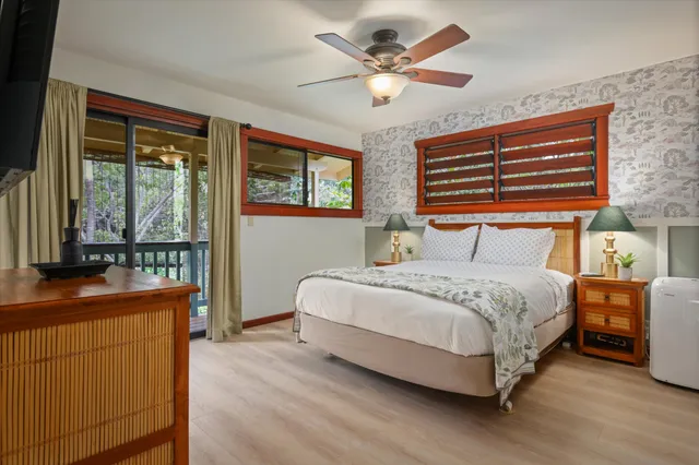 a bedroom with a bed and a table