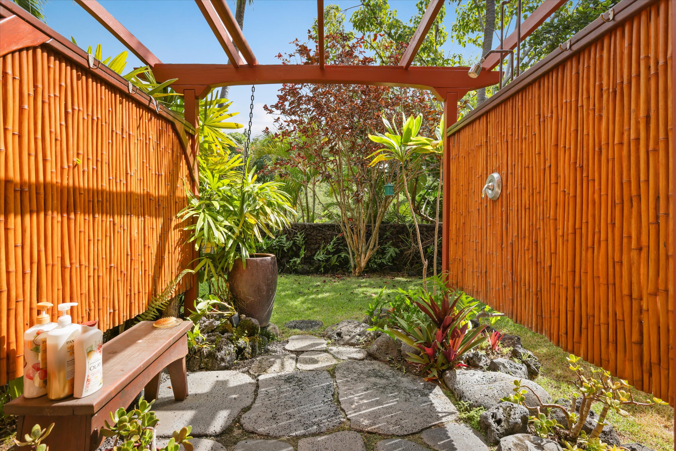 82-6289 Kahauloa Road Captain Cook, HI 96704 - Photo 20 of 29 a backyard with plants and outdoor seating