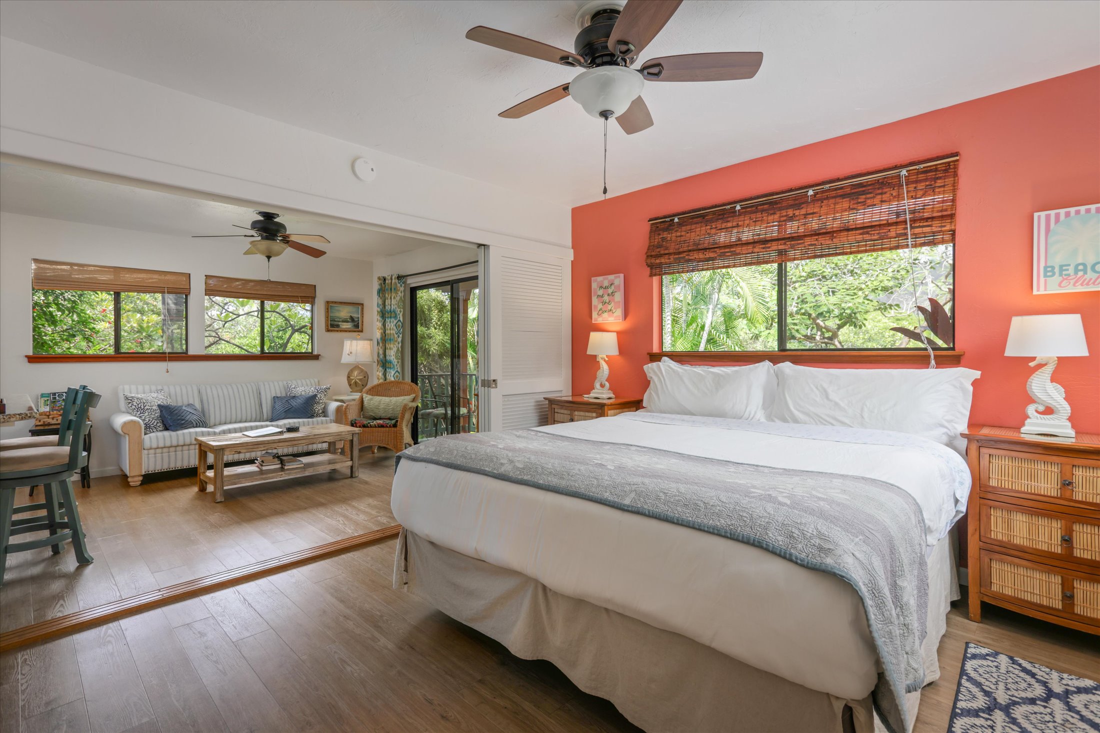 82-6289 Kahauloa Road Captain Cook, HI 96704 - Photo 23 of 29 a bedroom with furniture and a large window