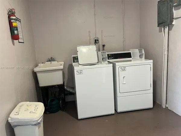 a utility room with dryer and washer