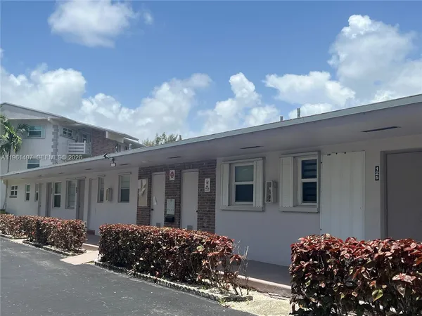 a view of a house with many windows