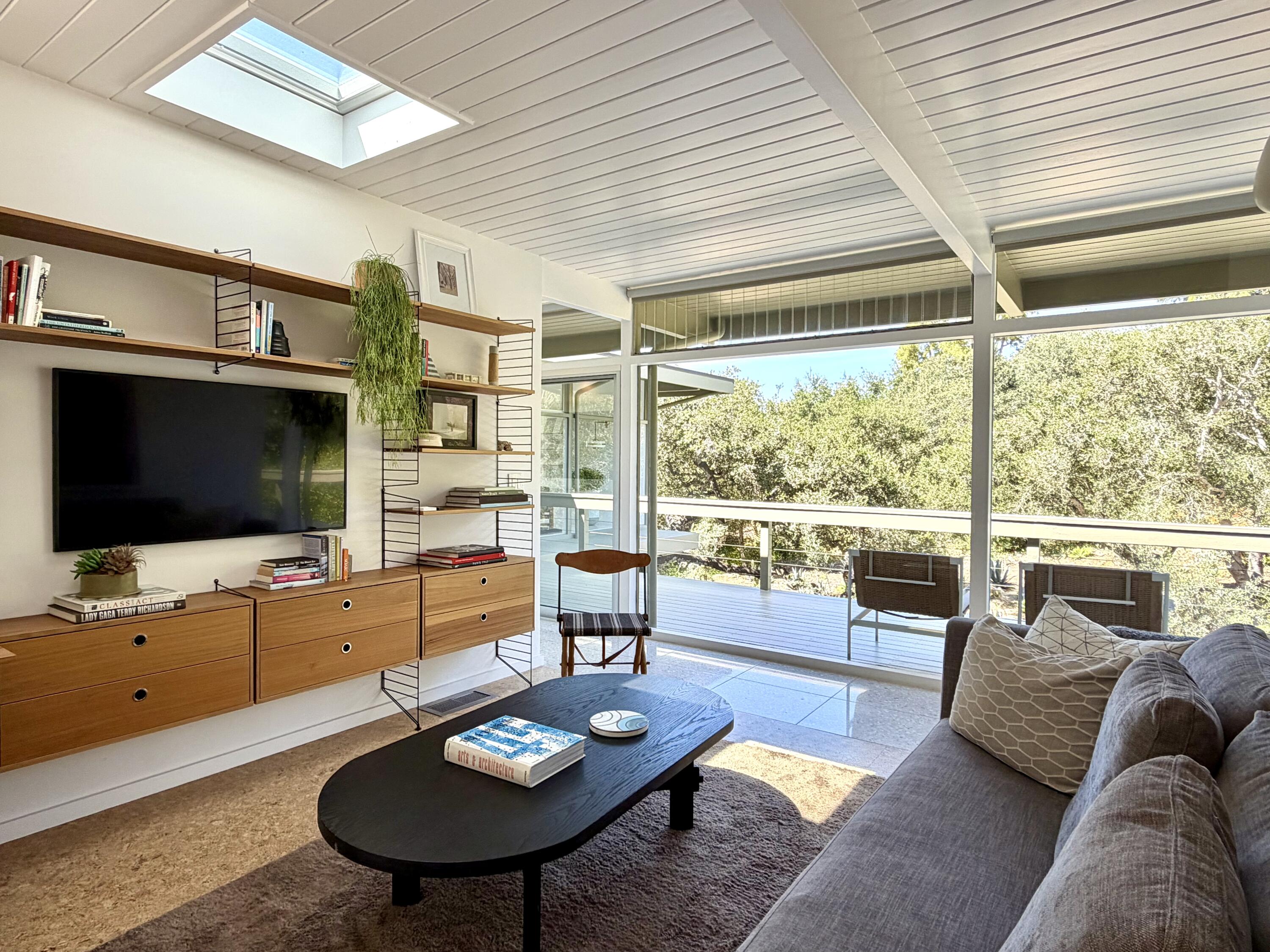 820 Summit Road Montecito, CA 93108 - Photo 16 of 29 a living room with furniture flat screen tv and a large window