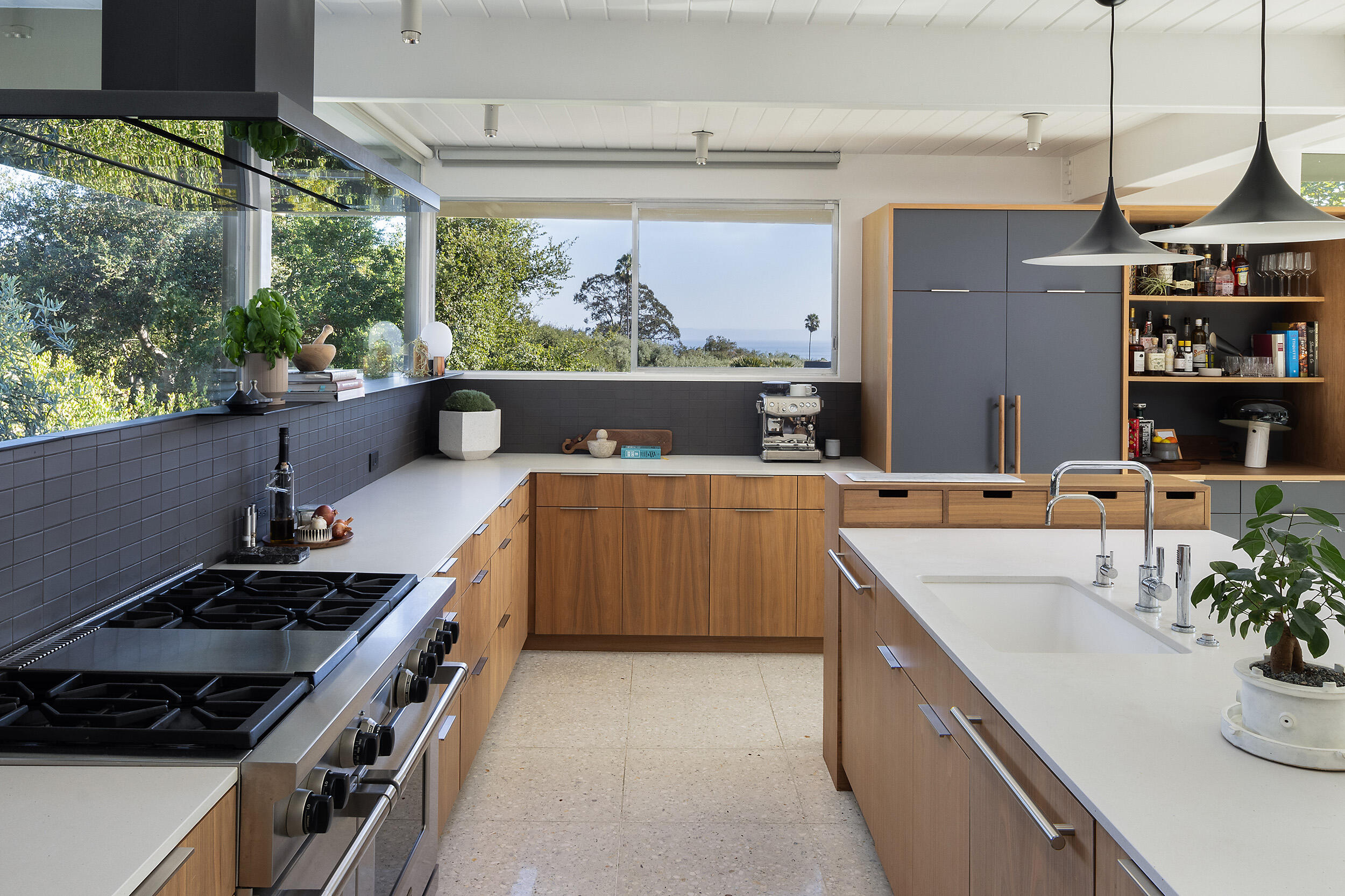 820 Summit Road Montecito, CA 93108 - Photo 6 of 29 a kitchen with stainless steel appliances a sink a stove and a wooden floor