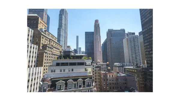 a city view with tall buildings