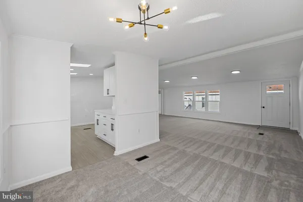 a view of a livingroom with furniture