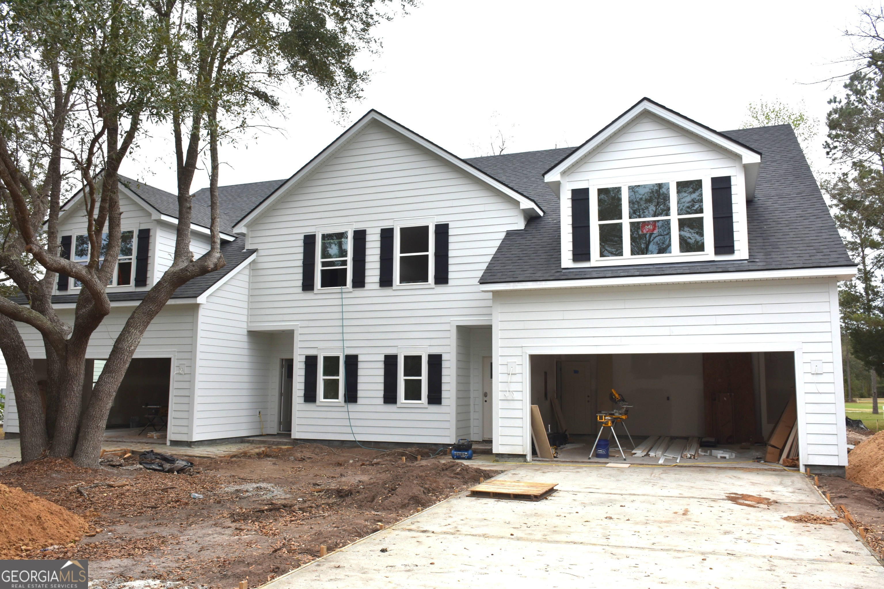 749 Mayflower Road Northeast Townsend, GA 31331 - Photo 1 of 5 a front view of a house with a yard