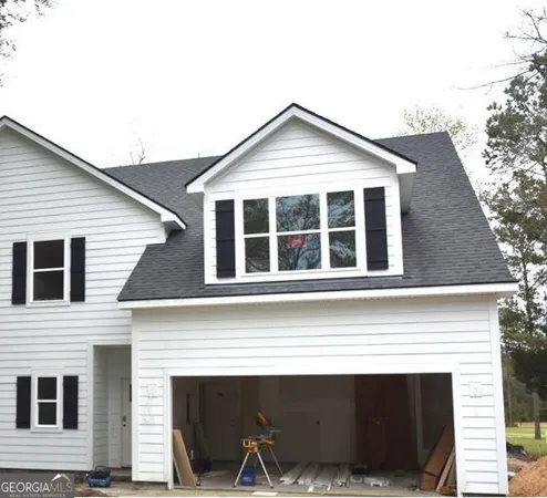 a view of house with front door