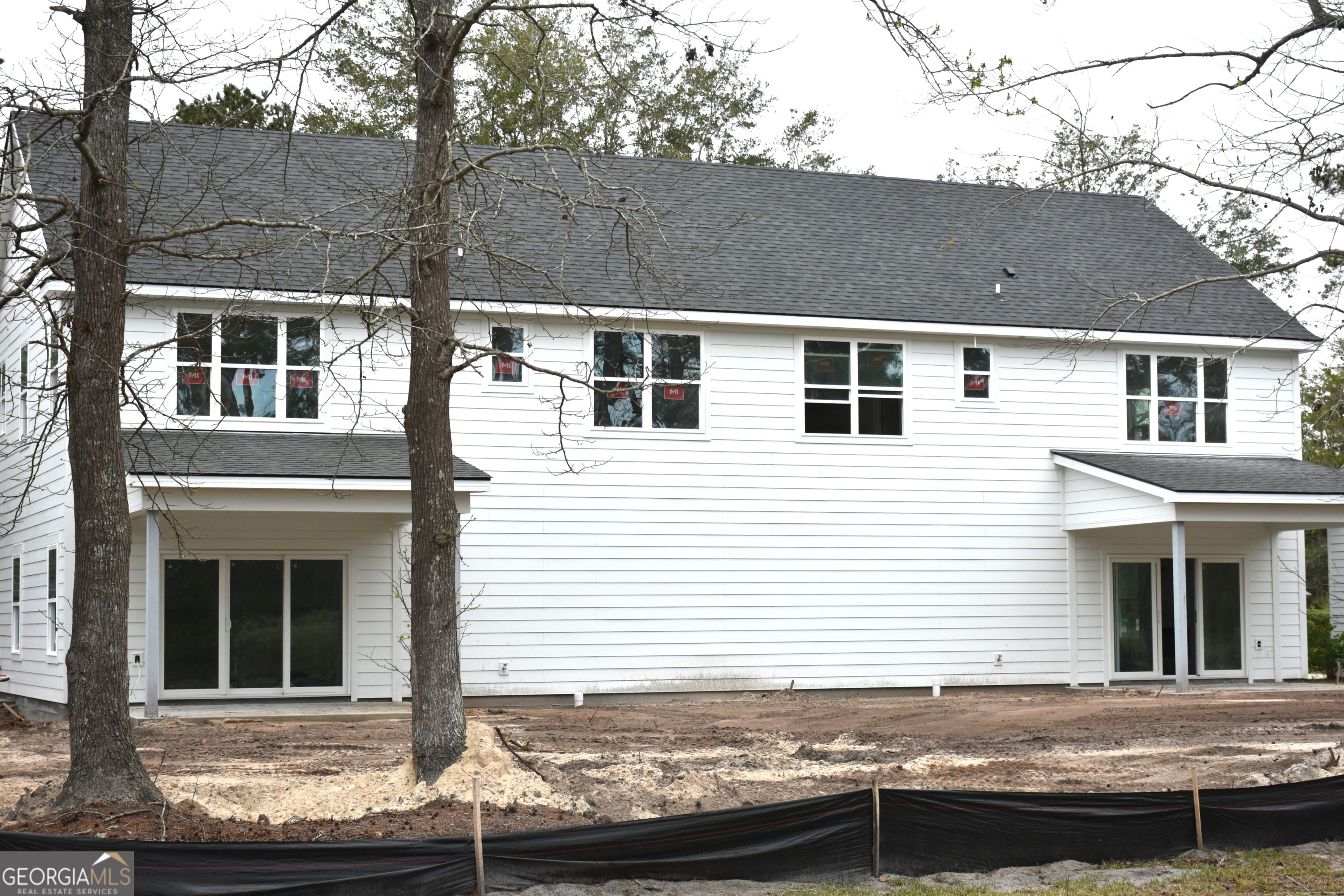 749 Mayflower Road Northeast Townsend, GA 31331 - Photo 3 of 5 a front view of a house with windows