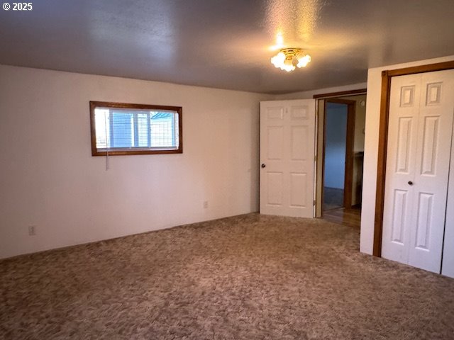 1645 4th Street Haines, OR 97833 - Photo 20 of 26 an empty room with windows and closet