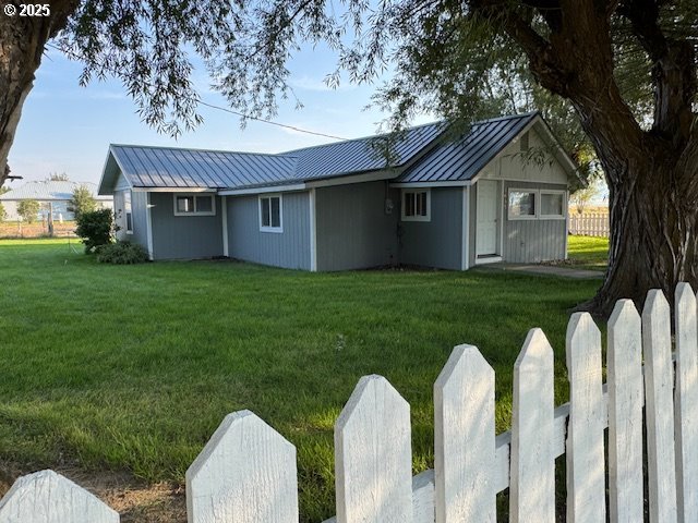 1645 4th Street Haines, OR 97833 - Photo 7 of 26 a view of a house with a backyard