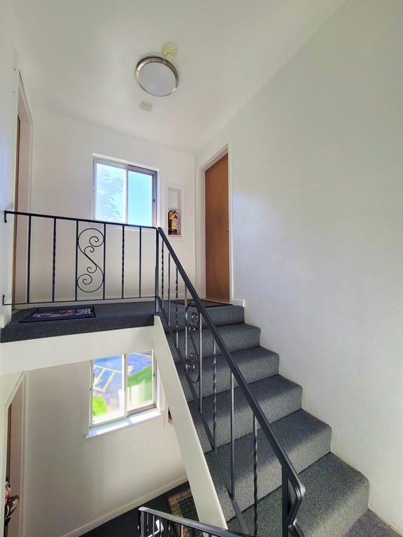 38 Will Drive, Unit 42 Canton, MA 02021 - Photo 22 of 25 a view of an entryway with wooden floor