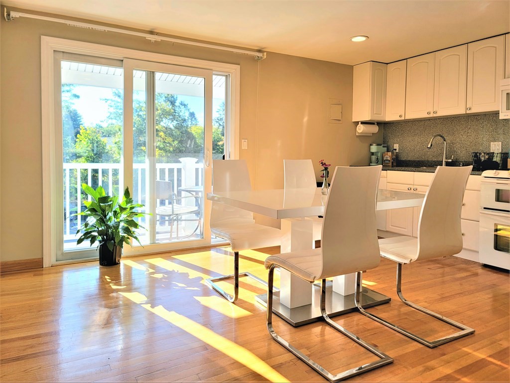 38 Will Drive, Unit 42 Canton, MA 02021 - Photo 3 of 25 a view of a living room with furniture and a potted plant