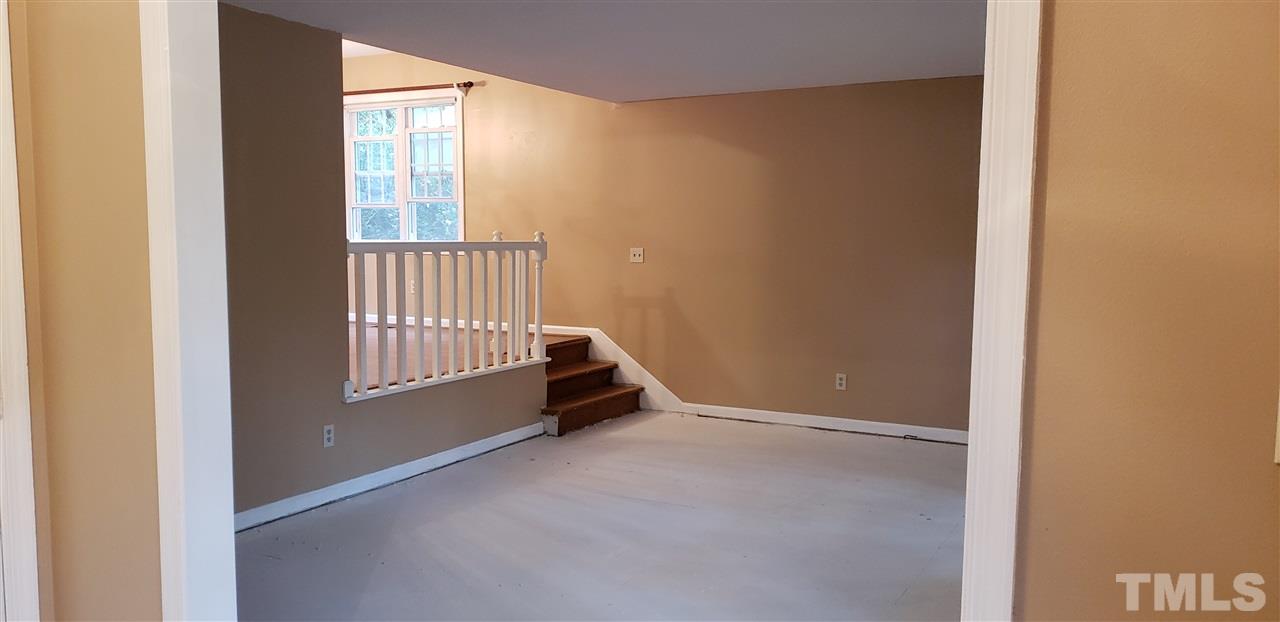 4101 Pickwick Drive Raleigh, NC 27613 - Photo 3 of 18 a view of an empty room with a window