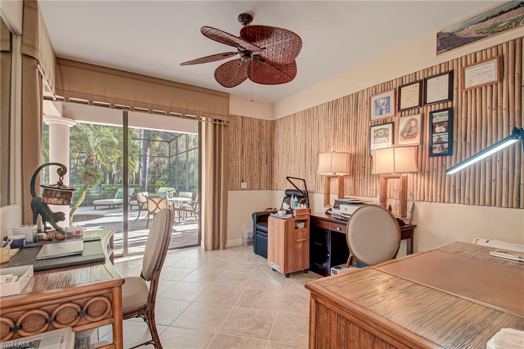 3126 Terramar Court Naples, FL 34119 - Photo 23 of 31 a bedroom with furniture and a large window