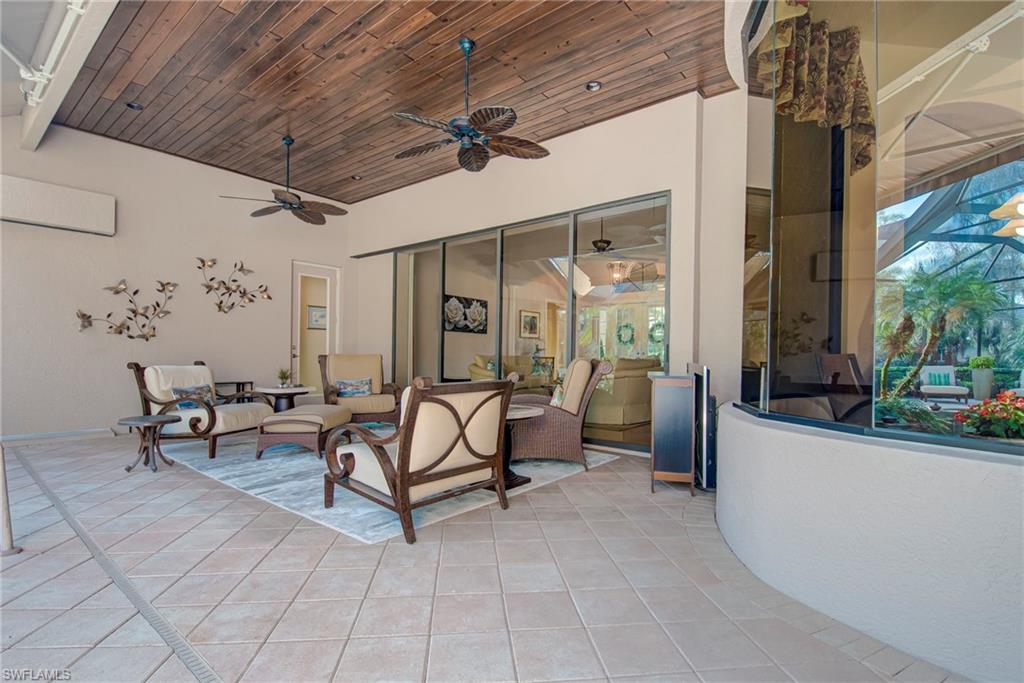 3126 Terramar Court Naples, FL 34119 - Photo 28 of 31 a living room with furniture