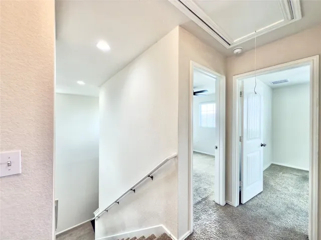 a view of a hallway with a elevator