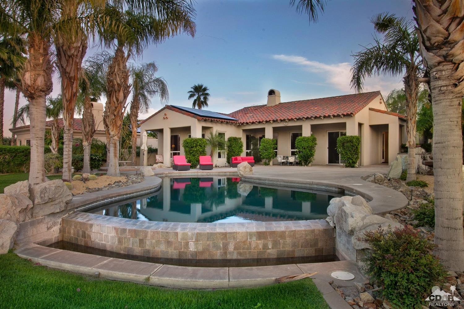 388 Loch Lomond Road Rancho Mirage, CA 92270 - Photo 1 of 41 a front view of house with yard and green space