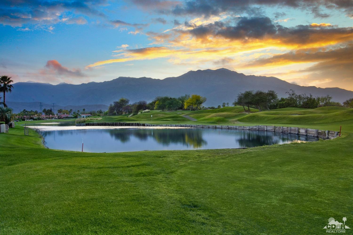 388 Loch Lomond Road Rancho Mirage, CA 92270 - Photo 2 of 41 a view of lake with mountain in the background