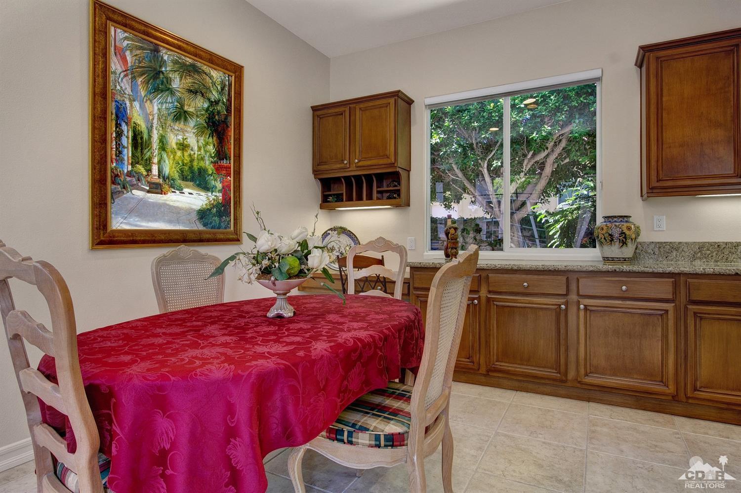 388 Loch Lomond Road Rancho Mirage, CA 92270 - Photo 21 of 41 a bedroom with a bed and wooden floor