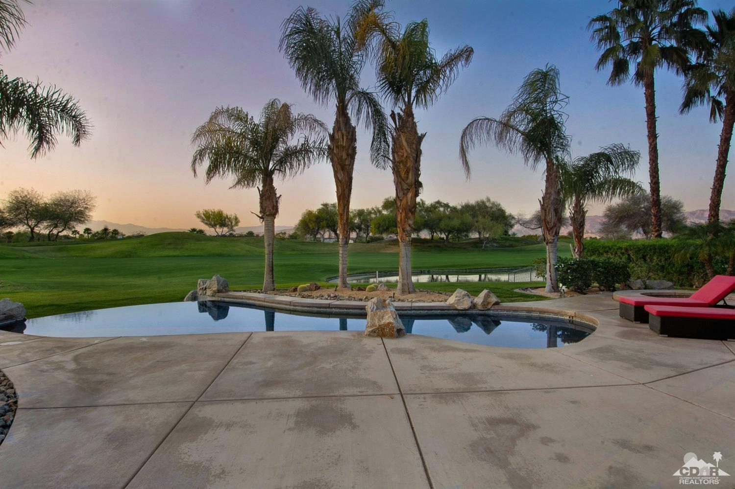 388 Loch Lomond Road Rancho Mirage, CA 92270 - Photo 4 of 41 a view of outdoor space with swimming pool and patio