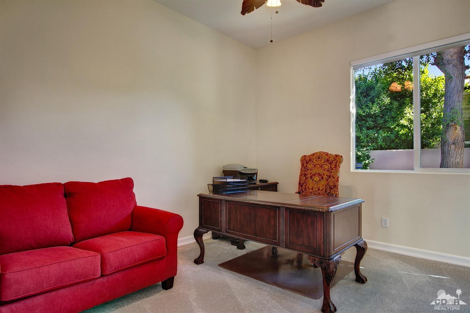 388 Loch Lomond Road Rancho Mirage, CA 92270 - Photo 36 of 41 a living room with furniture and a potted plant