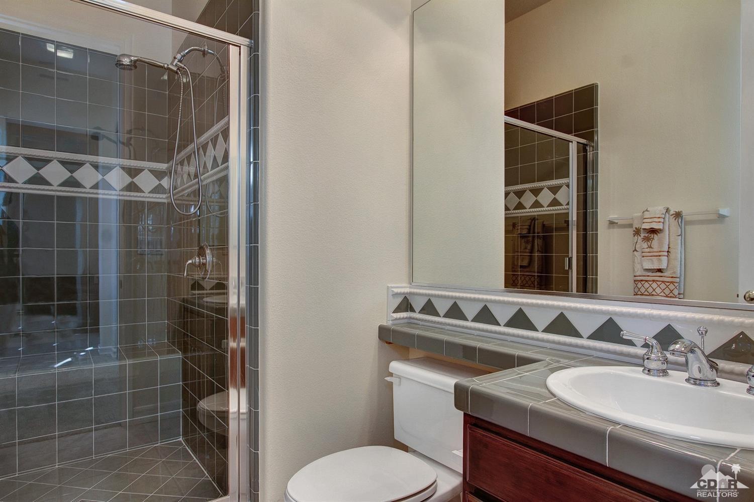 388 Loch Lomond Road Rancho Mirage, CA 92270 - Photo 38 of 41 a bathroom with a sink toilet and shower