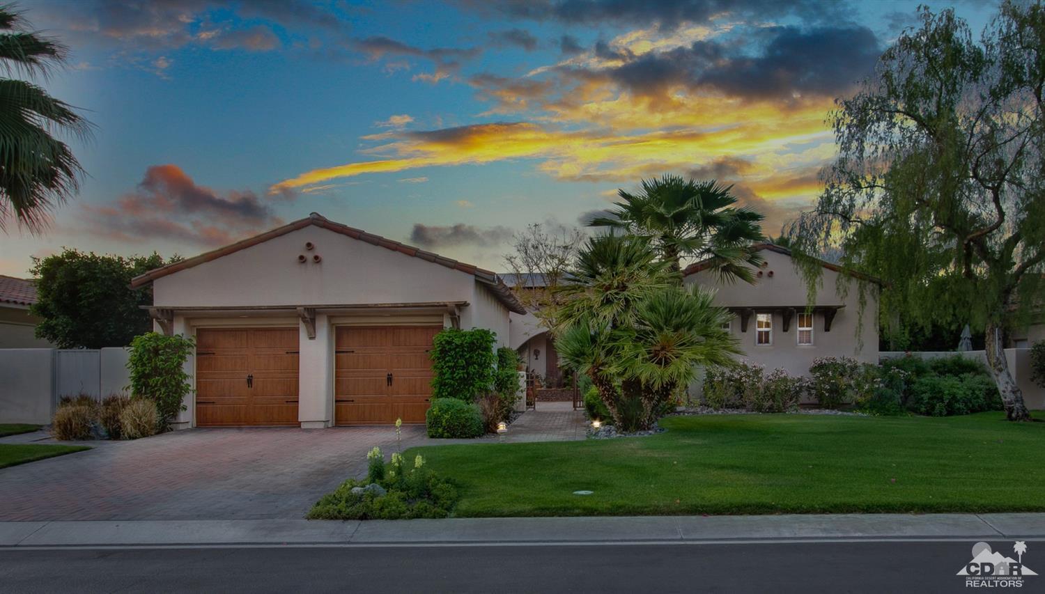 388 Loch Lomond Road Rancho Mirage, CA 92270 - Photo 39 of 41 a view of a house with a yard