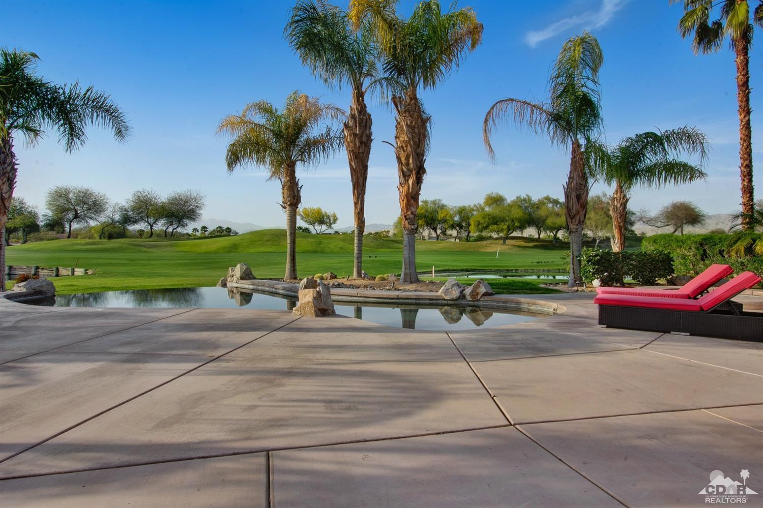 388 Loch Lomond Road Rancho Mirage, CA 92270 - Photo 41 of 41 a row of palm trees and a park