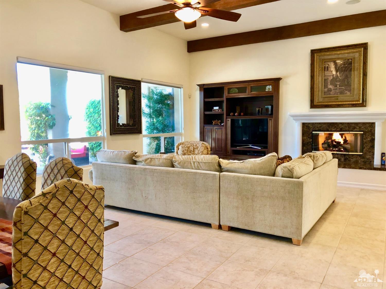 388 Loch Lomond Road Rancho Mirage, CA 92270 - Photo 9 of 41 a living room with furniture and window