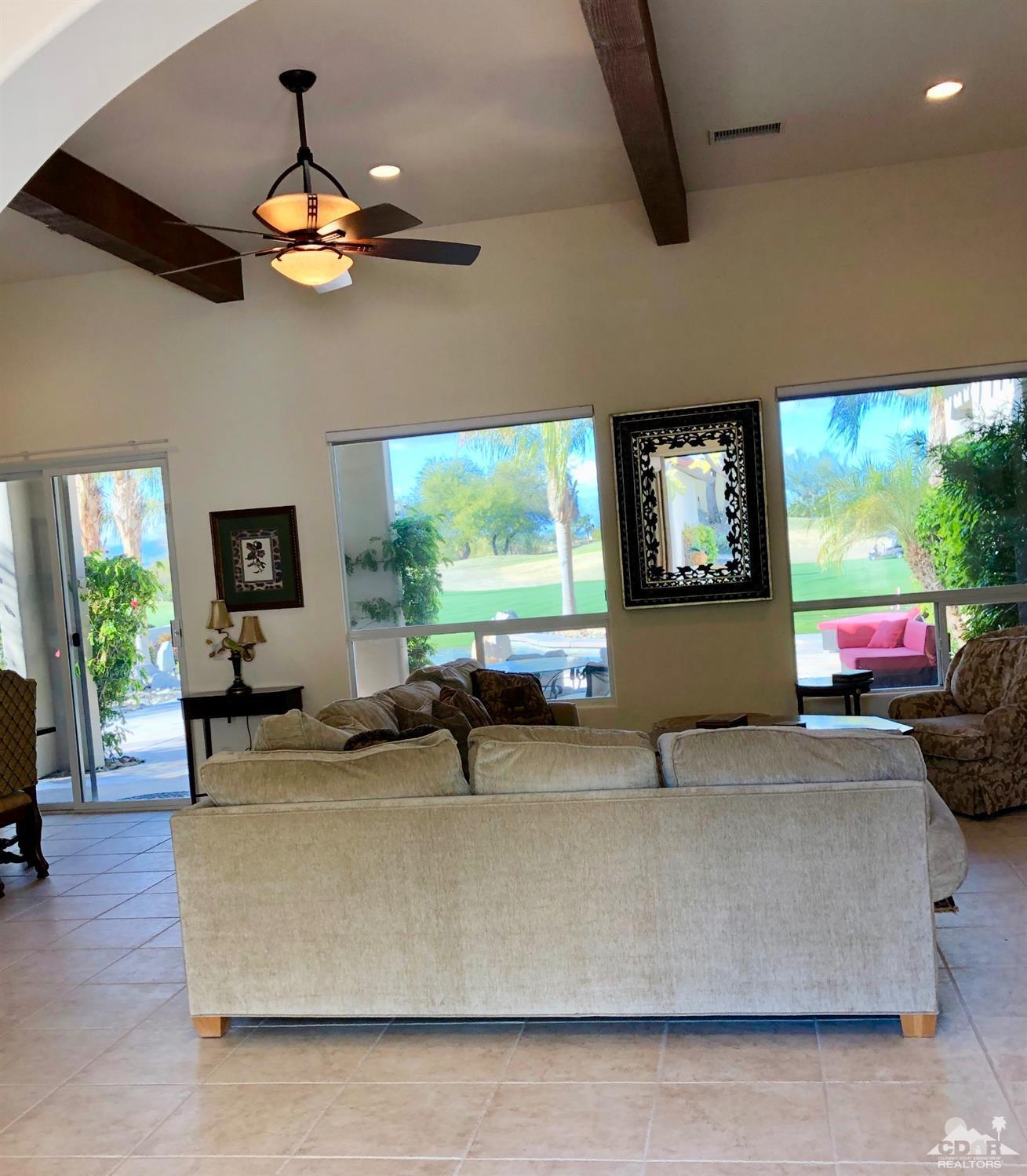 388 Loch Lomond Road Rancho Mirage, CA 92270 - Photo 10 of 41 a living room with furniture and a flat screen tv