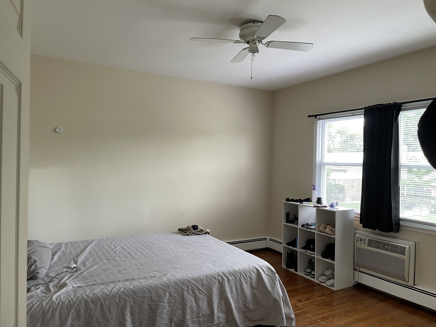8743-45 East Prairie Road Skokie, IL 60076 - Photo 16 of 21 a bedroom with a bed and a flat screen tv