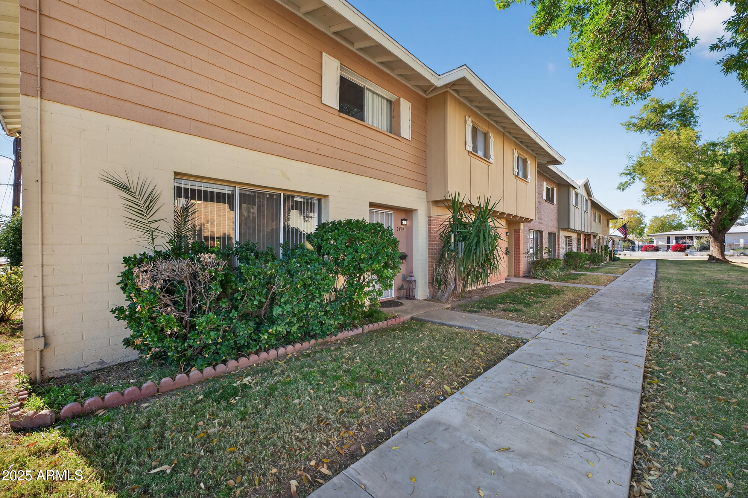 3929 South Mill Avenue Tempe, AZ 85282 - Photo 21 of 26 front view of a house with a yard