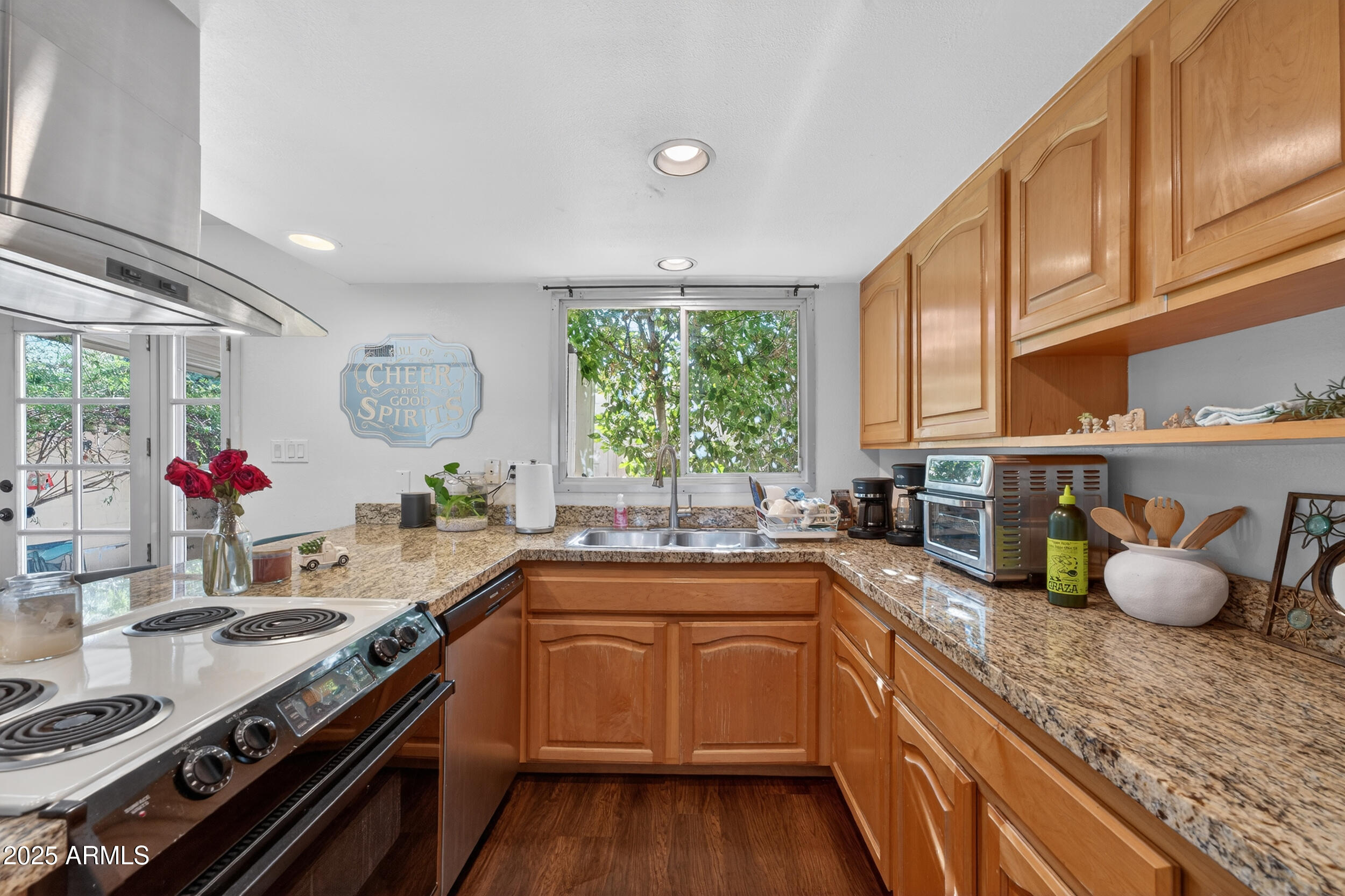 3929 South Mill Avenue Tempe, AZ 85282 - Photo 4 of 26 a kitchen with a sink stove and cabinets