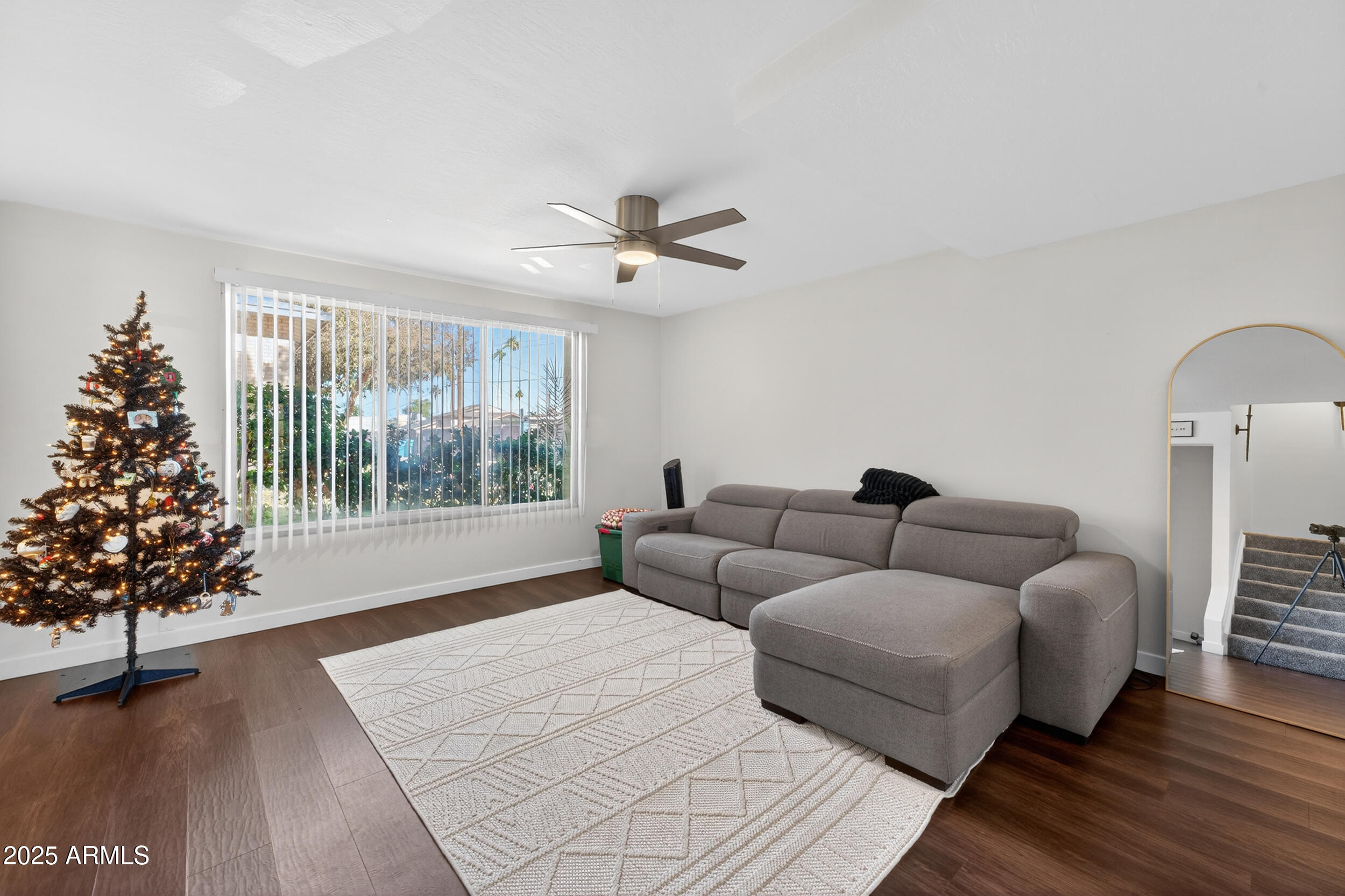 3929 South Mill Avenue Tempe, AZ 85282 - Photo 8 of 26 a living room with furniture and a large window