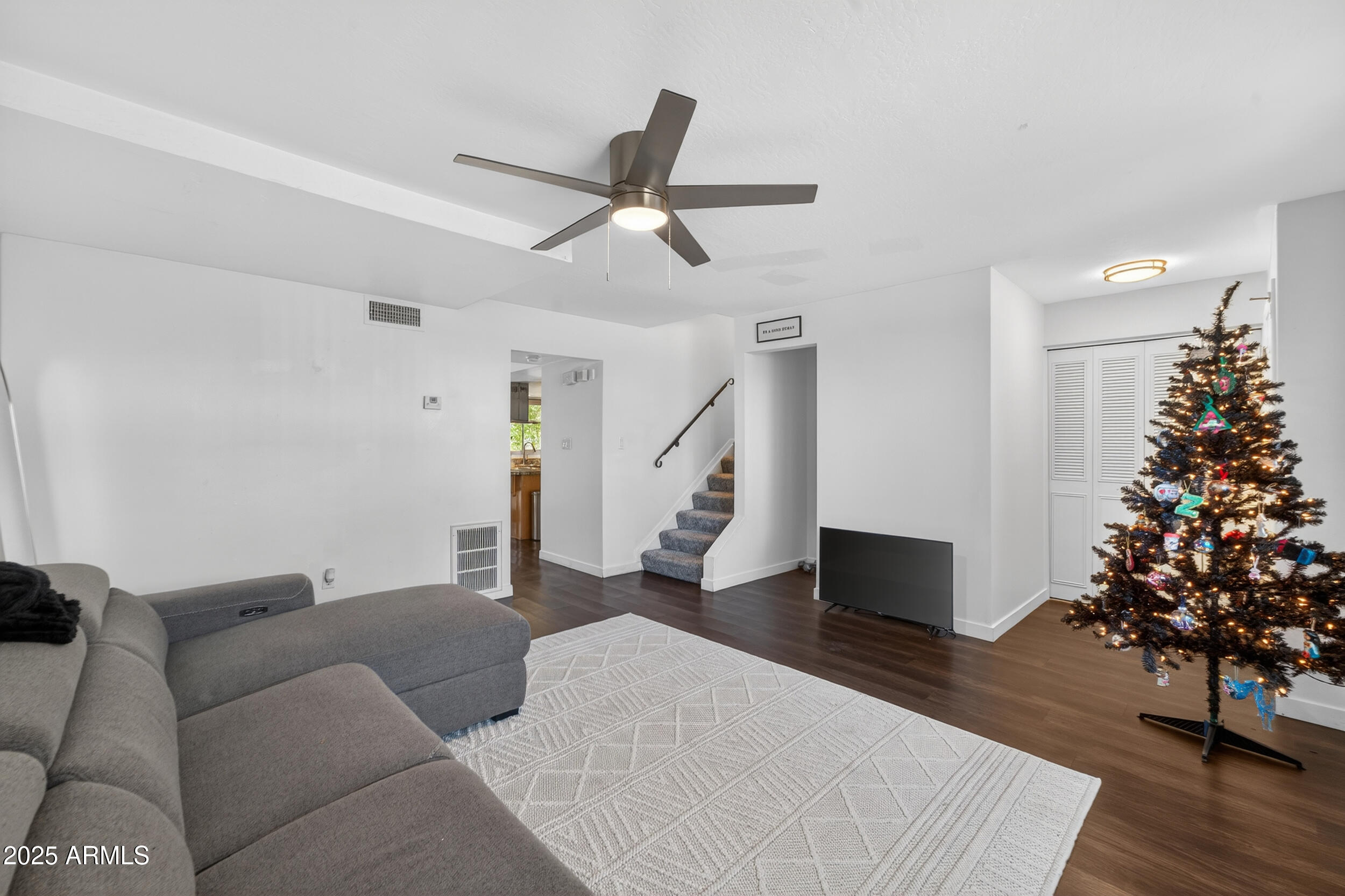 3929 South Mill Avenue Tempe, AZ 85282 - Photo 10 of 26 a living room with furniture and a potted plant