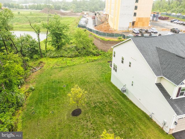 a view of a swimming pool from a balcony