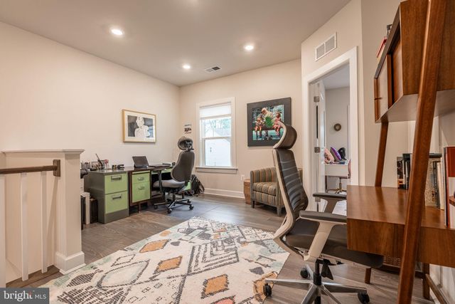 a view of a livingroom with furniture and a couch