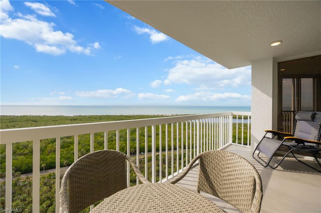 6573 Marissa Loop, Unit 2005 Naples, FL 34108 - Photo 3 of 25 a balcony view with a couch