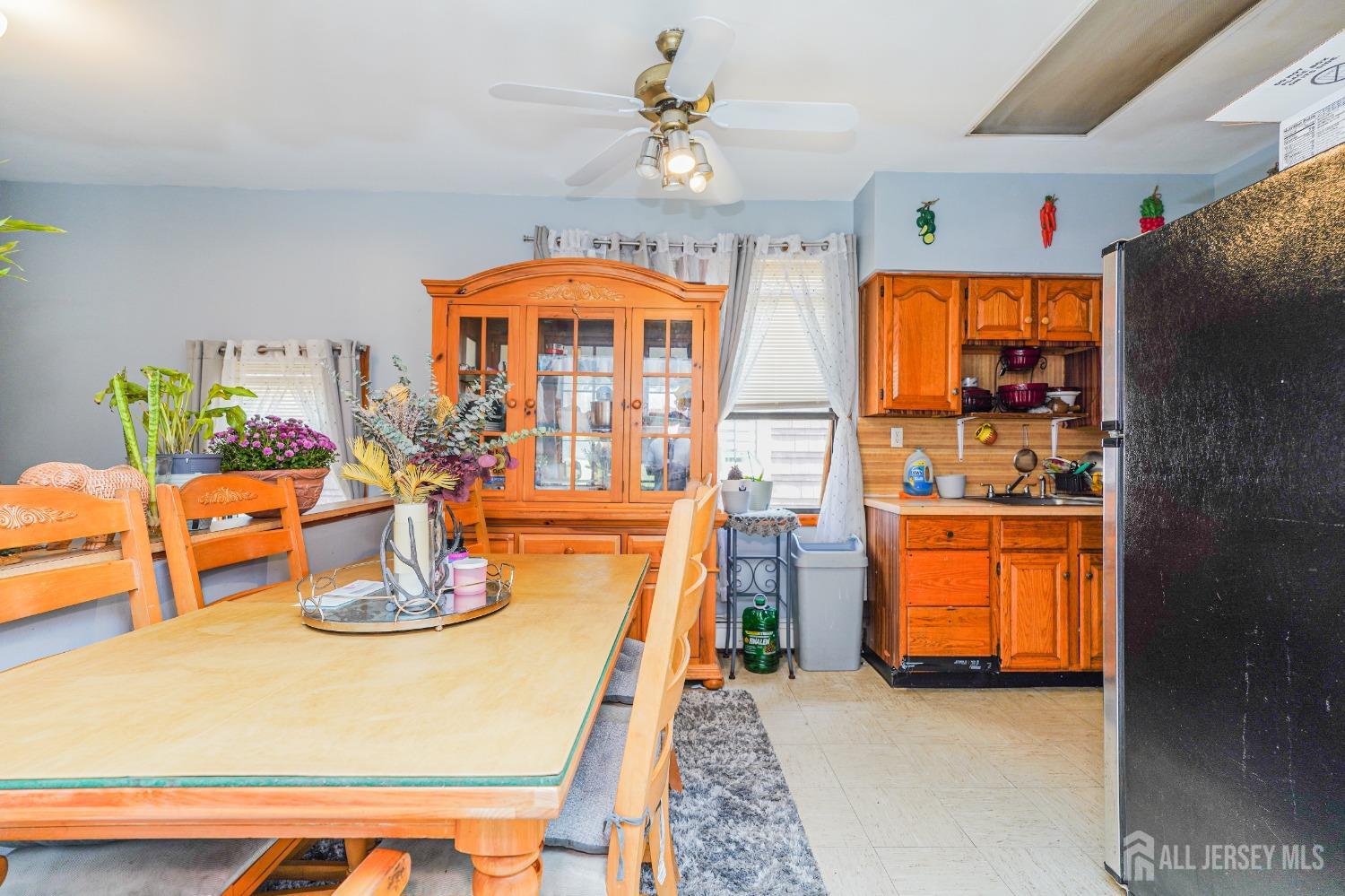 38 Handy Street New Brunswick, NJ 08901 - Photo 4 of 32 a dining room with furniture a window and kitchen view
