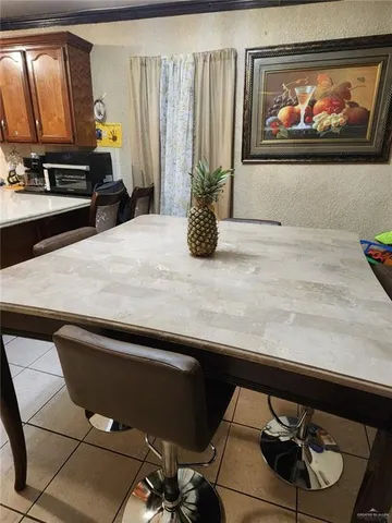 a room with a sink and a mirror