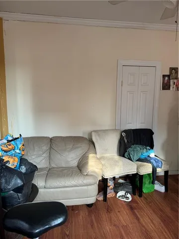 a bed room with a bed and a chandelier