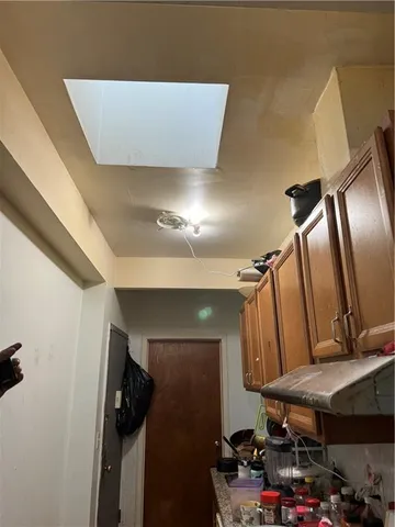 a building with potted plants in front of it