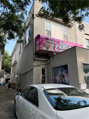 a view of a house with tub sink and outdoor space