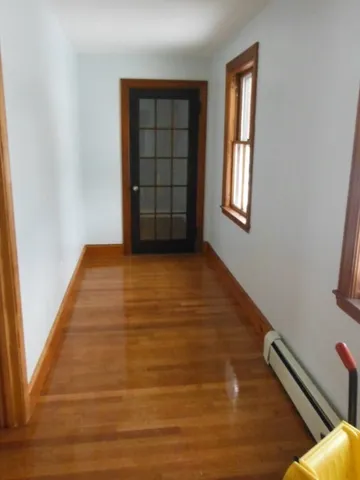 a kitchen with granite countertop a sink and a stove