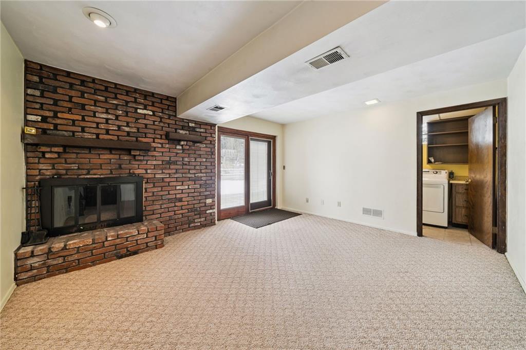 982 Braddock Road Pittsburgh, PA 15221 - Photo 13 of 32 a view of empty room with a fireplace