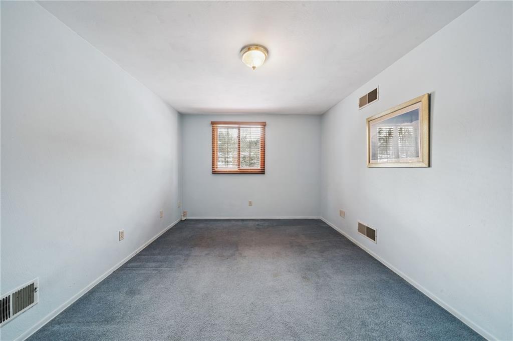982 Braddock Road Pittsburgh, PA 15221 - Photo 24 of 32 an empty room with windows