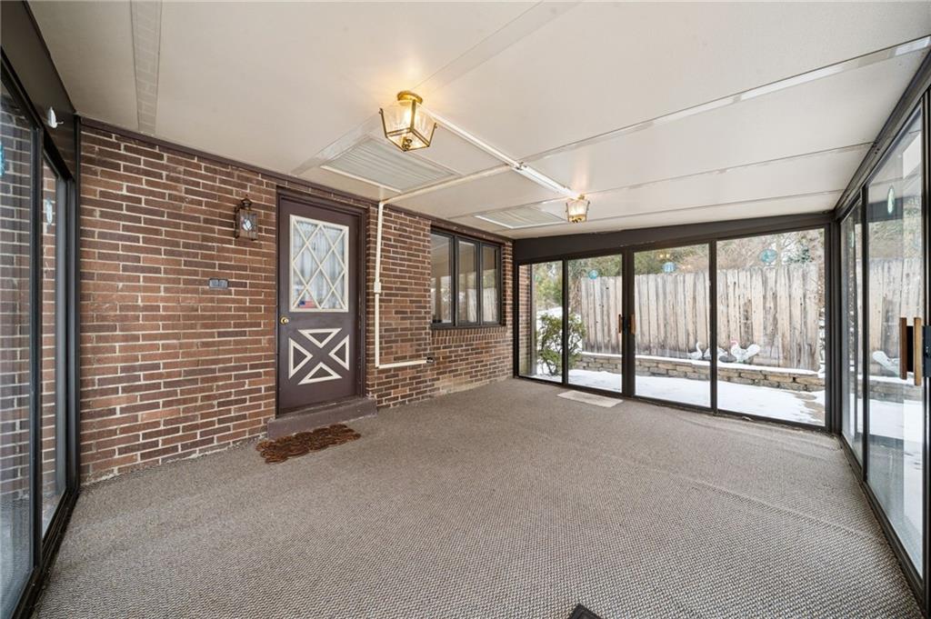 982 Braddock Road Pittsburgh, PA 15221 - Photo 26 of 32 a view of an empty room with a window