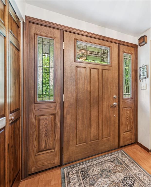 982 Braddock Road Pittsburgh, PA 15221 - Photo 3 of 32 a view of an entryway with wooden floor