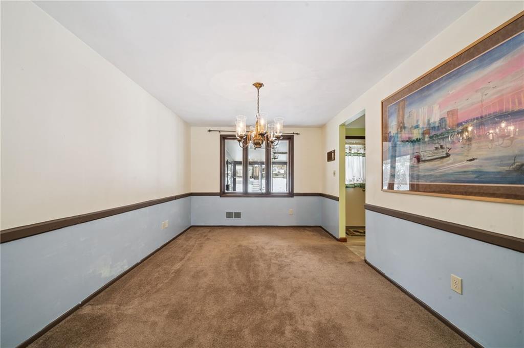 982 Braddock Road Pittsburgh, PA 15221 - Photo 9 of 32 a view of an empty room and window