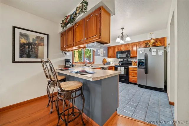 $475,000 | 828 Foxhead Shores Drive, Linn Creek, MO 65052